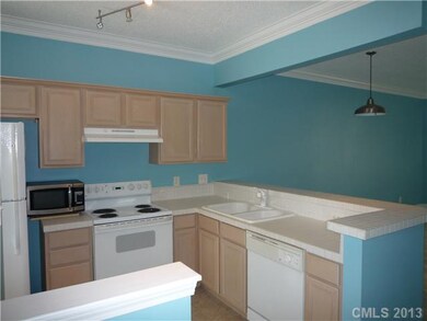 Kitchen - Comes complete with stove, frig, dishwas