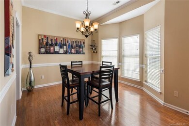 The dinin area offers hardwood floors an angled ba