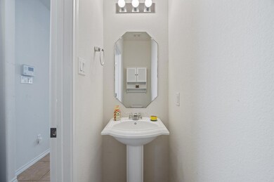 Bathroom with tile patterned flooring