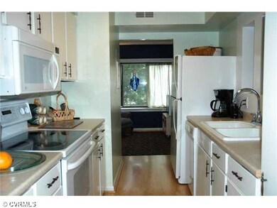 Kitchen - Updated kitchen with wood laminate floor