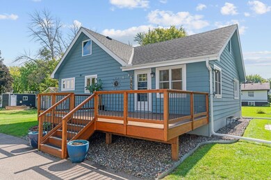 Welcoming entry with well-maintained deck