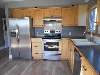 A modern updated kitchen with all new appliances