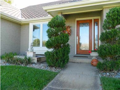 Welcome home!Note the beautiful leaded glass front