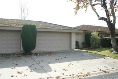 Detached two car garage with sectional roll up doo