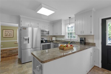 The bright Kitchen is a cook's dream!  Stainless Steel appliances are less than a year old!