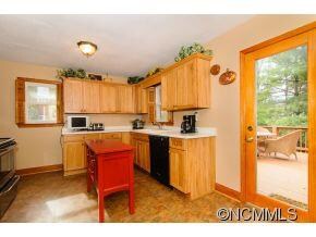 Kitchen opens to rear deck.