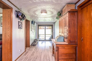 Foyer which leads out to the covered deck