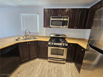 Kitchen featuring appliances with stainless steel