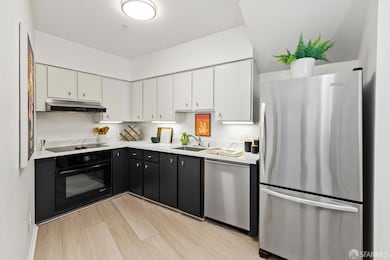 Newly refreshed kitchen with quartz countertops.