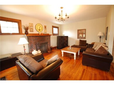 Living Room with Fireplace and Hardwood Floors
