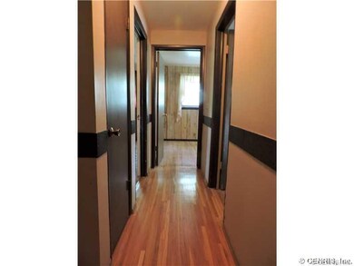Other. View of hallway - hardwoods in each of the 