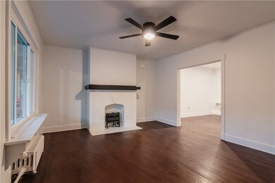 Living room with the original wood floors finished
