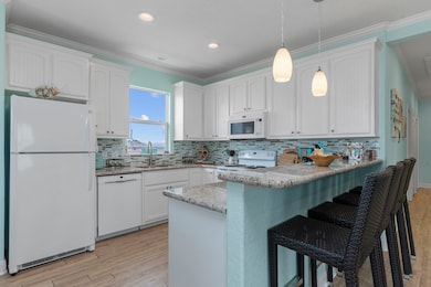 Kitchen is light, bright and open