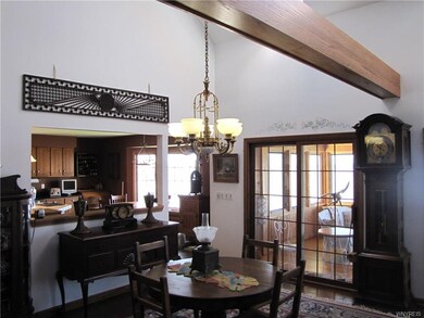 The Dining Room opens to the Kitchen and 3 Season 