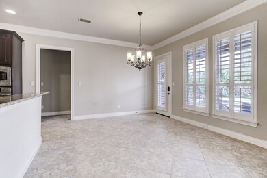 This large breakfast area is great for a table for two or eight! The large windows provide great natural light and a relaxing view of the backyard.