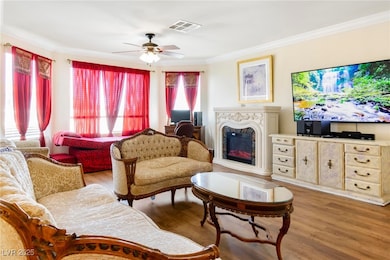 Living room with hardwood / wood-style floors, cei