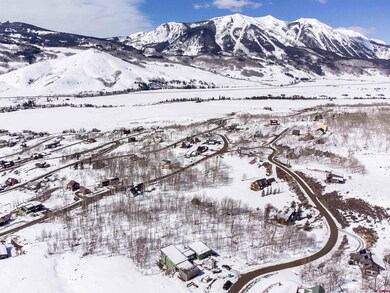Snowy aerial view with a mountain view