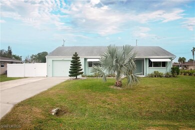 View of front of home featuring a front lawn