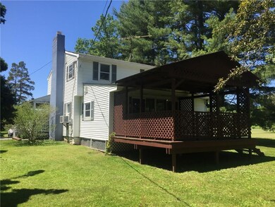 Covered porch facing front yard.