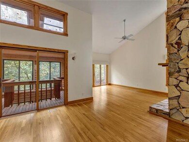 Open dining room & family room w/ stone gas firepl