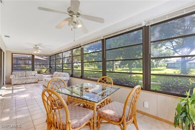 Sunroom featuring ceiling fan