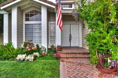 Welcome home! Beautiful curb appeal, stone and bri