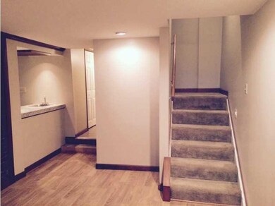 Living Room. The second floor leads to the over si