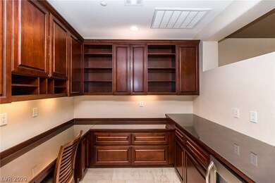 DEN/OFFICE/BUTLERS PANTRY. NEXT TO KITCHEN AREA.