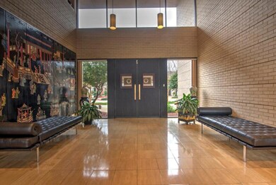 Front foyer with 24 ft high ceiling, 8 ft tall ent