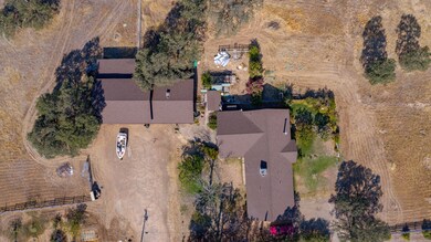 7.4 acres w/ 2518 soft home in Redding
