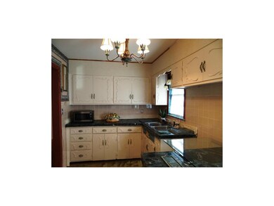 The Adorable Kitchen With Marble Counter Tops & Ce
