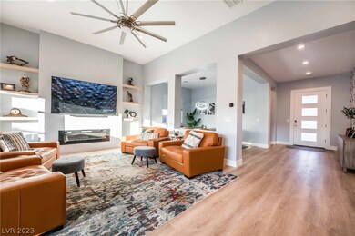 Great room plan with custom ceiling fan, fireplace