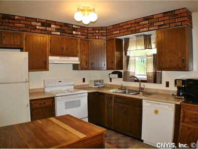 Kitchen. Updated counters, sink faucet, flooring a