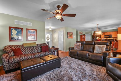 Hardwood floors, upgraded fan, surround sound wire