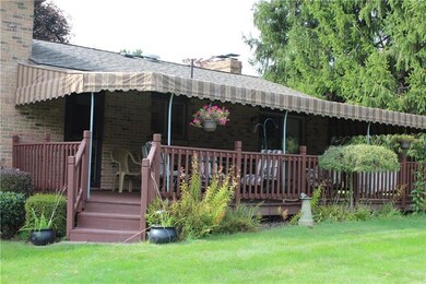 Back deck with canvas awning installed.