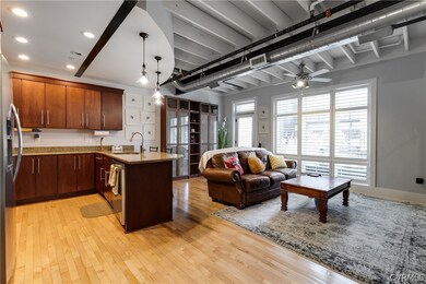 open layout with kitchen and living room