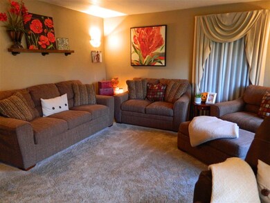 Large living room with nice large window allowing 