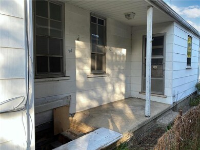 side 2, showing 1st FL kitchen door and basement access
