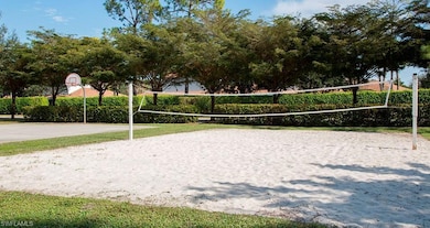 View of community featuring volleyball court