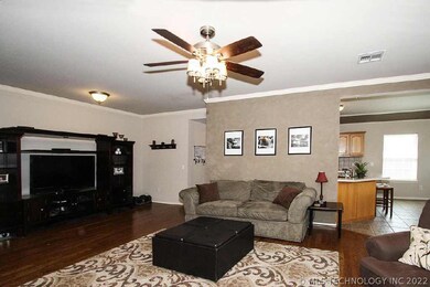 Very large living with new wood floors, & gas log