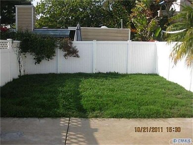 Rear Grassy Fenced Area