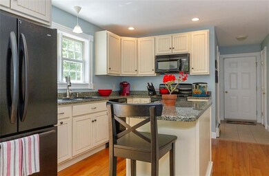 Kitchen is convenient to laundry and...