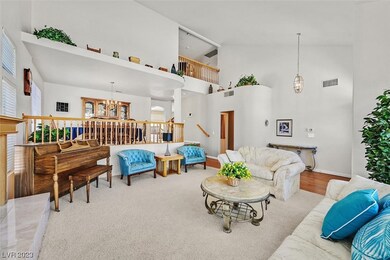 Living room, formal dining room and entry into hom