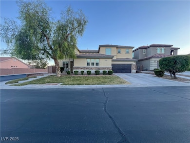 View of front facade featuring concrete driveway,