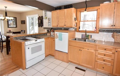 Beautiful kitchen with tile flooring.