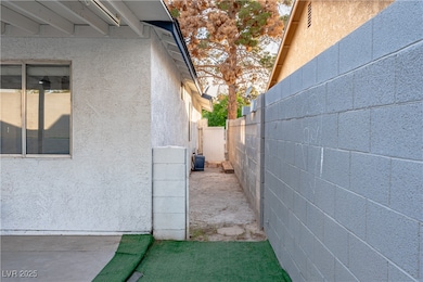 View of side of property with stucco siding