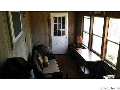 Porch - Enclosed. Enclosed Porch attached to garag