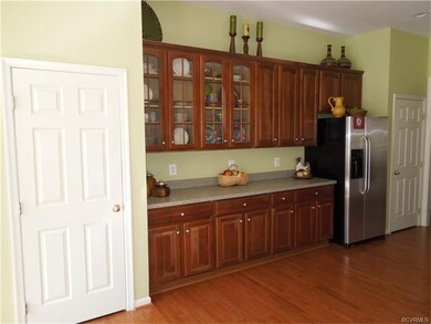 Two pantries on either side of lovely cabinets.