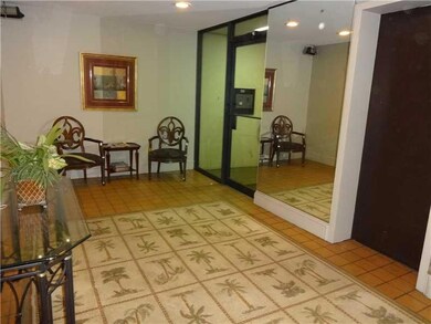 Foyer. Foyer of condo building. Glass door entranc