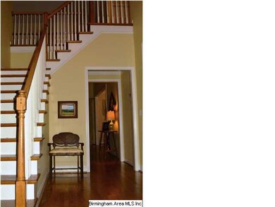 Entry foyer with hardwood floors